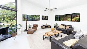 Living area - Treetops Retreat: A Serene Rainforest Escape with Mountain Views (Brinsmead)