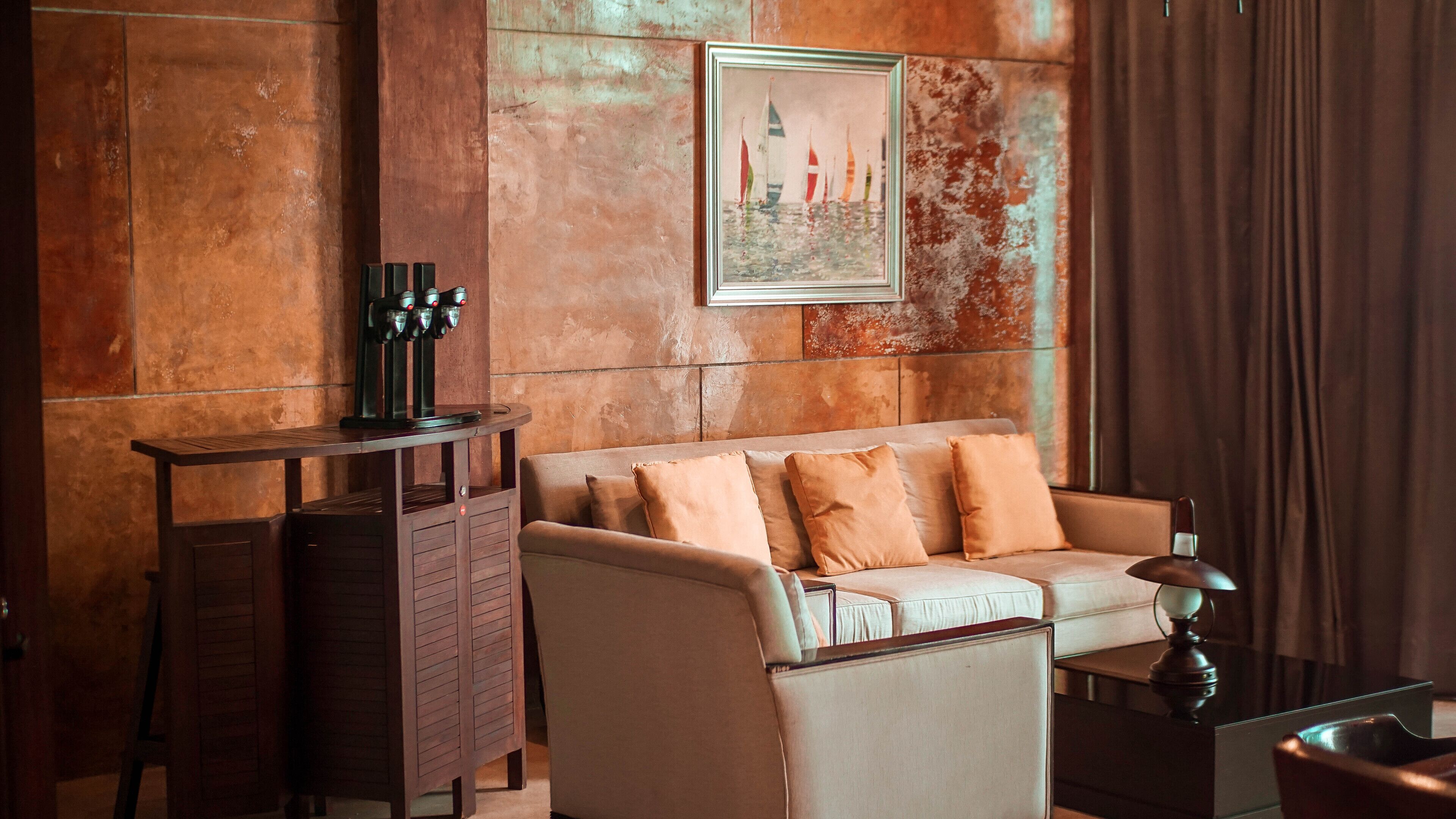 Suite estudio superior, vista parcial al océano | Cocina privada | Cafetera de espresso, artículos de limpieza y comedor 