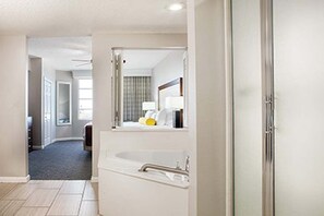 Shower, jetted tub, hair dryer, towels