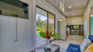 Deluxe Apartment, Pool Access, Pool View | Living area - Oso Perezoso Pool Villa (Cahuita)