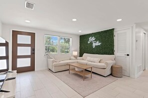 TV, offices - Casa Coco: Updated Home Walking Distance to Beach (Jacksonville Beach)