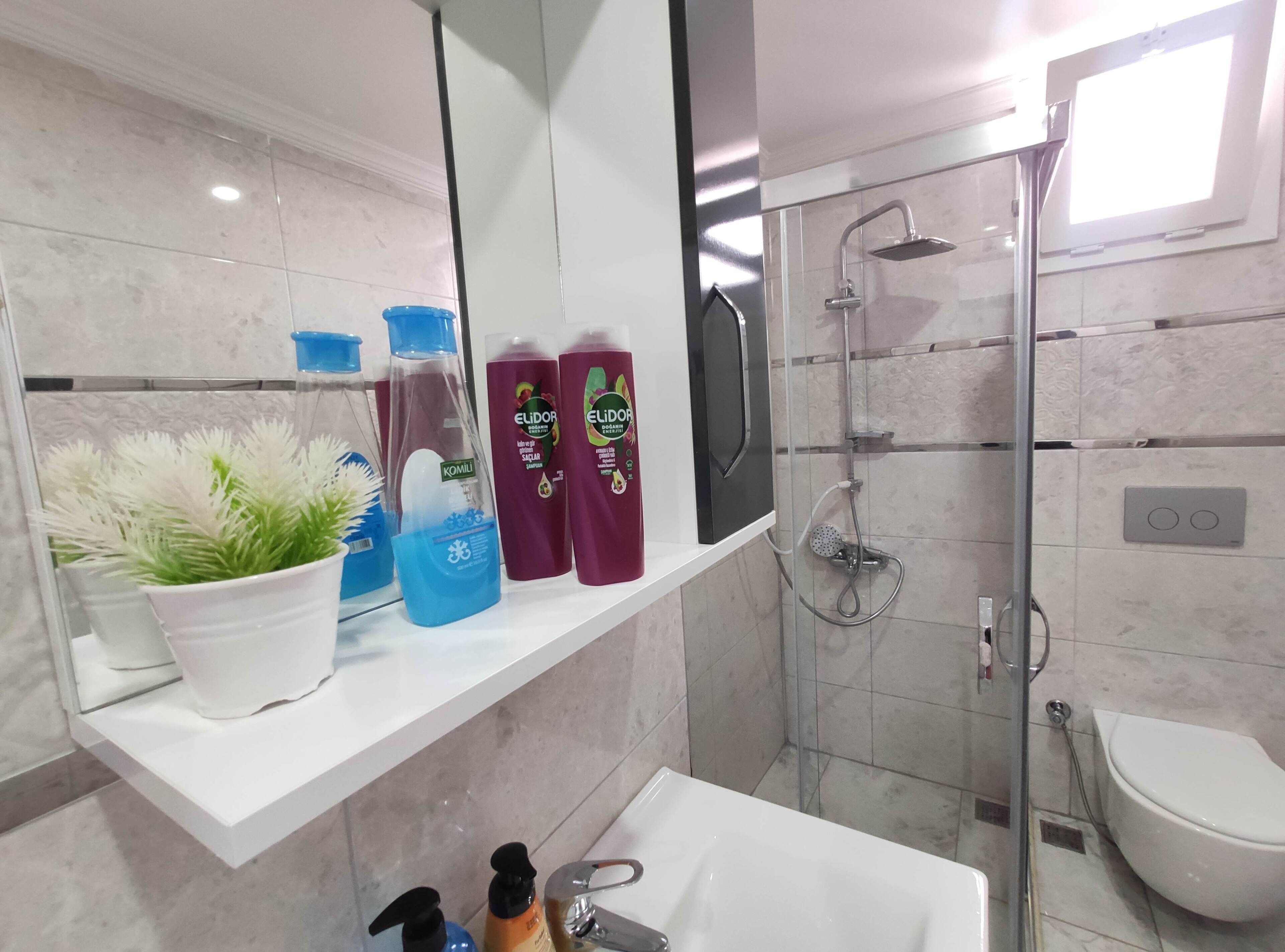 Hair dryer, towels, soap, shampoo