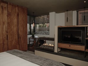 Loft 2 Matisse | リビング エリア | 48 インチのスマートテレビ (デジタル放送視聴可)、テレビ、暖炉