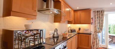 Fridge, dishwasher, cookware/dishes/utensils