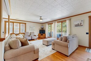 TV - Secluded waterfront home with private dock, outdoor dining, firepit, WiFi & W/D (Orland)