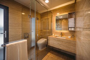 Separate bathtub and shower, jetted bath, hair dryer, bathrobes