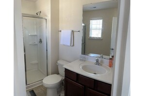 Combined shower/bathtub
