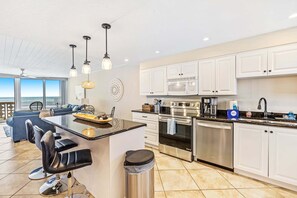 Fridge, microwave, oven, stovetop - Wait 'n Sea Golden Arms Condo ~ Beachfront ~ Walk to Shopping, Dining & Entertainment!  ~ GA502 (New Smyrna Beach)