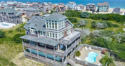 Towering beach house with private pool, hot tub, decks & ocean views