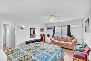 Studio Suite | Living area | TV, smart speakers