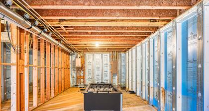 +4 acre lakefront retreat with private boat slip, wraparound porch, grill, & W/D