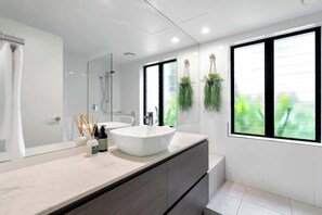 Shower, hair dryer, shampoo