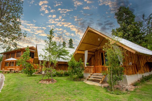 A Bungalow with attached kitchen in rural environment