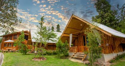 A Bungalow with attached kitchen in rural environment