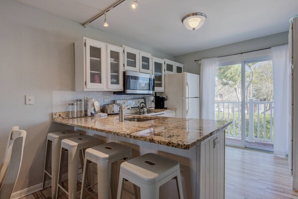 Fridge, microwave, dishwasher, coffee/tea maker