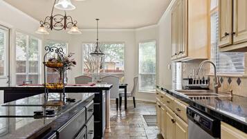 Villa | Private kitchen | Fridge, microwave, oven, stovetop