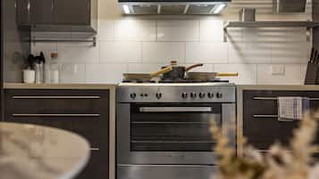 Microwave, stovetop, dishwasher, cookware/dishes/utensils