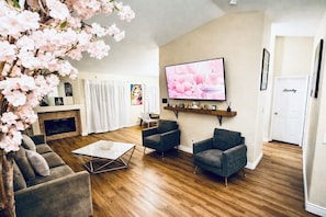Smart TV, fireplace, foosball