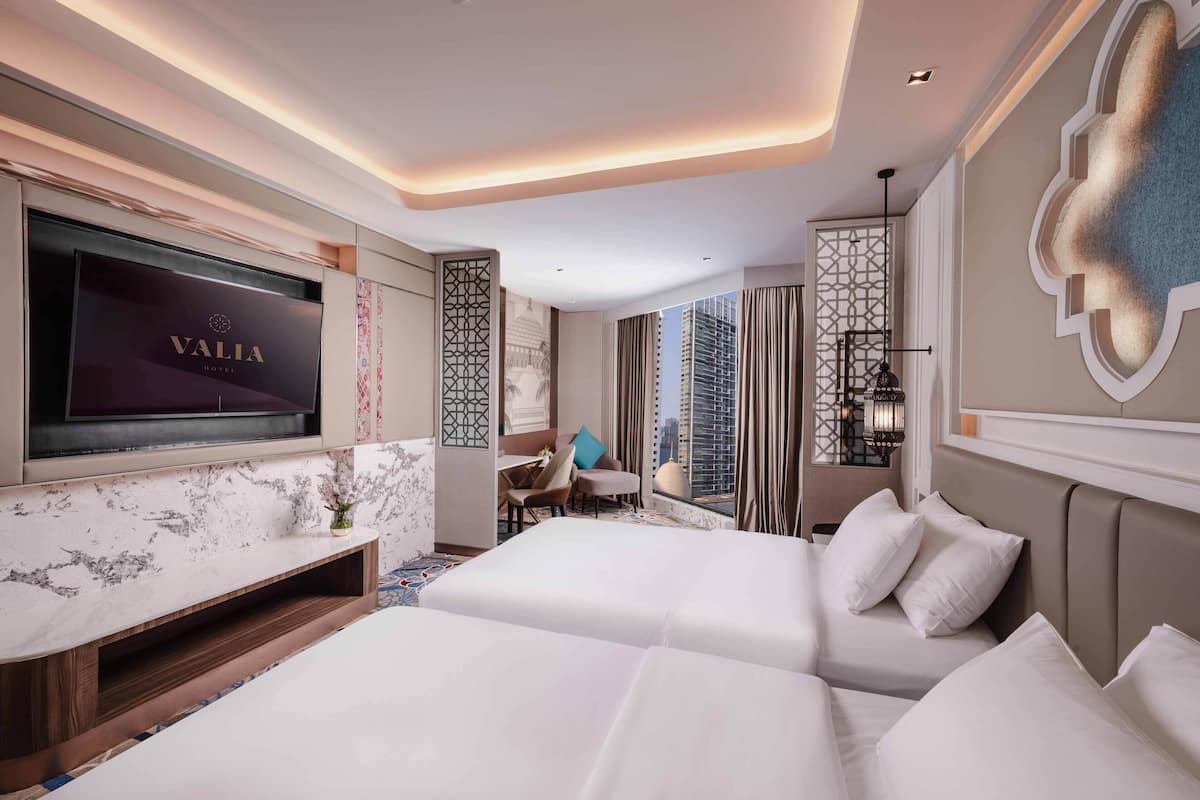 Roba de llit d'alta qualitat, minibar i caixa forta a l'habitació 