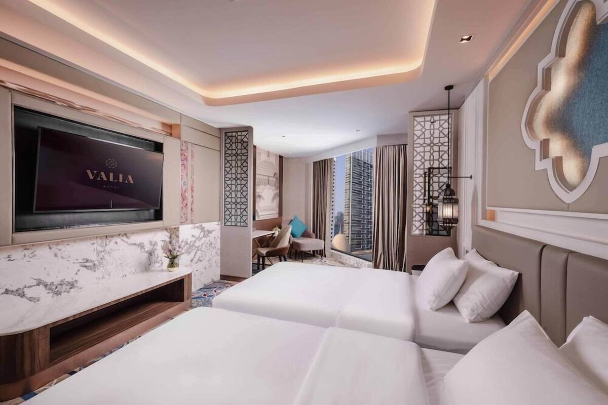 Roba de llit d'alta qualitat, minibar i caixa forta a l'habitació 