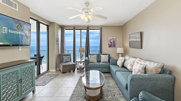 Family Condo, 3 Bedrooms, Ocean View, Beachfront | Living room | 50-inch Smart TV with cable channels, TV