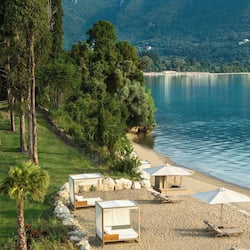 Private beach, white sand, sun loungers, beach umbrellas