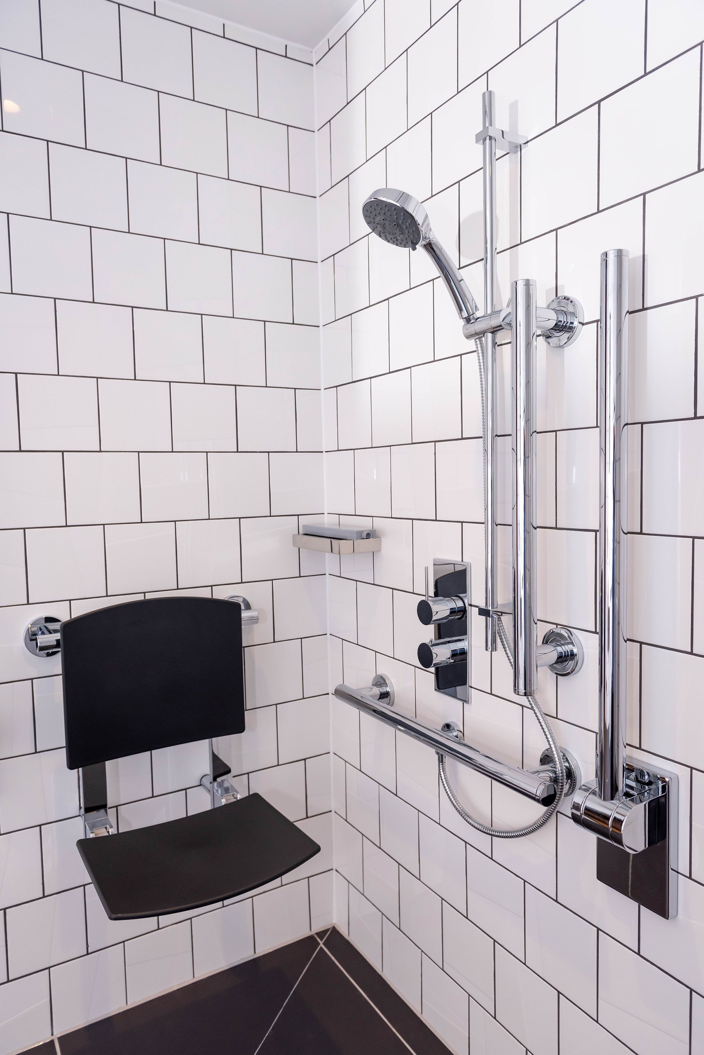 Deluxe-rum | Badrum | Dusch, hårtork och handdukar