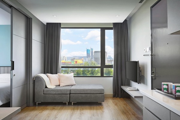 Two Bedroom Studio | Living area | 42-inch Smart TV with satellite channels, TV