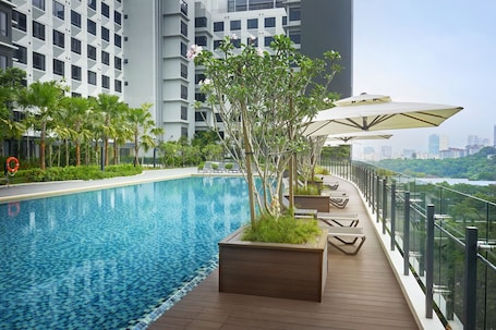 Indoor pool, outdoor pool. Komune Living & Wellness in the Park