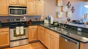 Condo, 2 Bedrooms | Private kitchen - 411 Holiday Isle 411 by ACP (Dauphin Island)