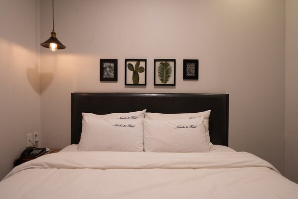 Chambre Double Standard | Literie de qualité supérieure, articles gratuits dans le mini-bar