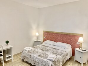 1 bedroom, desk, iron/ironing board, travel cot