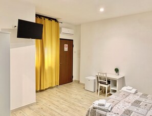 1 bedroom, desk, iron/ironing board, travel cot
