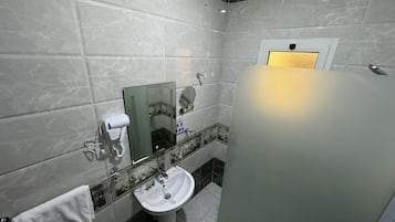 Slippers, bidet, towels