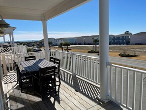 Outdoor dining - Enjoy luxury in this 5BR, 5BA home with private pool in Sunset Beach, NC. (Sunset Beach)