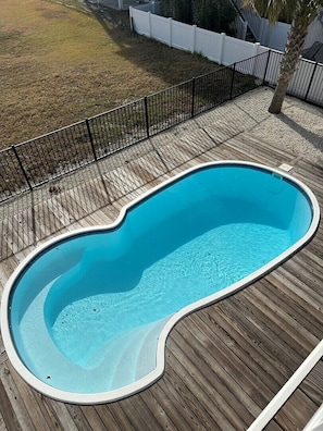 Pool - Enjoy a relaxing stay at 1204 ENS - Lil Nauti, a charming 3-bedroom home in Sunset Beach. (Sunset Beach)