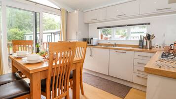 Fridge, dishwasher, electric kettle, cookware/dishes/utensils