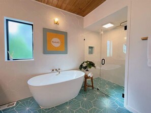 Bathtub, hair dryer, shampoo