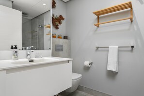 Shower, hair dryer, towels, soap