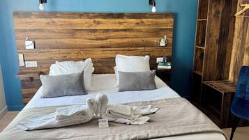 Premium bedding, desk, laptop workspace, free WiFi