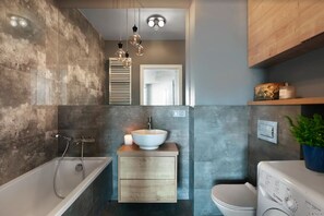 Premium appartement | Badkamer | Een haardroger