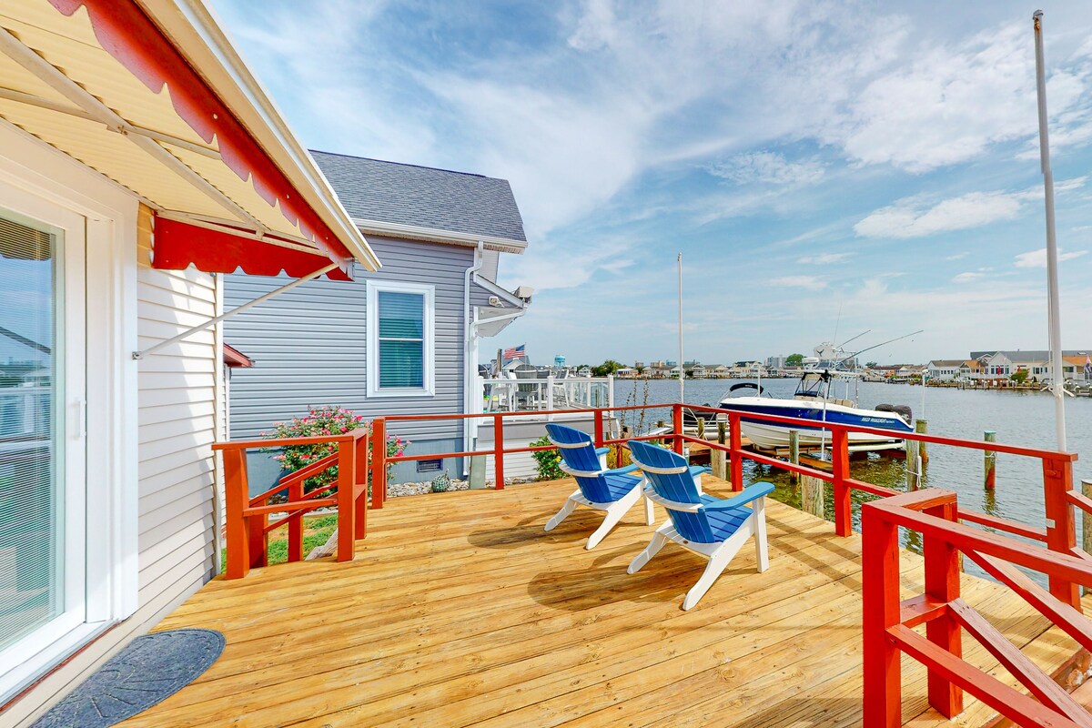Renovated waterfront home with dock, bay access, & shared pool/tennis