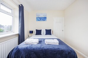 2 dormitorios, tabla de planchar con plancha, wifi gratis y ropa de cama