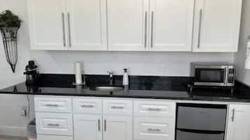 Fridge, microwave, coffee/tea maker, toaster