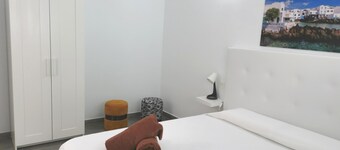 Two bedroom apartments with double beds.