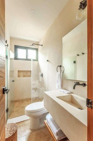 Shower, hair dryer, towels, soap