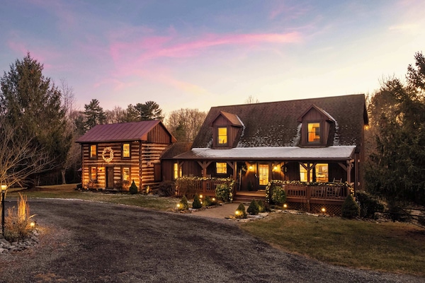 Arrive at The Royal Cabin as sunset lights the 1789 logs—your private Shenandoah retreat begins here.