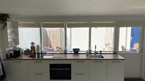 Coffee/tea maker, fridge, microwave, oven