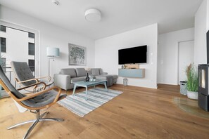 TV, fireplace, stereo - "Ocean Feeling" sea view vacation apartment on the Baltic Sea - 3 minutes walk to the beach (Olpenitz)