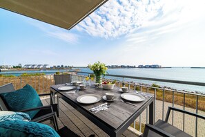 Outdoor dining - Vacation apartment "Ocean Life" - 3 minutes walk to the beach, fireplace & dog welcome! (Olpenitz)